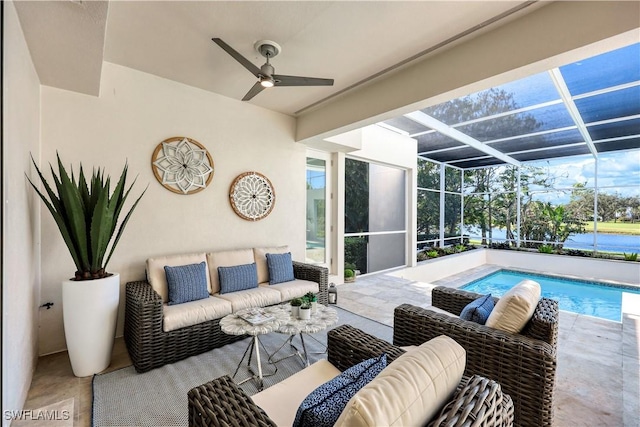 view of patio with ceiling fan, outdoor lounge area, and glass enclosure