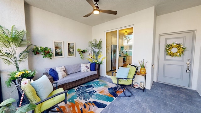 view of patio / terrace with ceiling fan