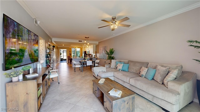 tiled living room with ceiling fan and ornamental molding