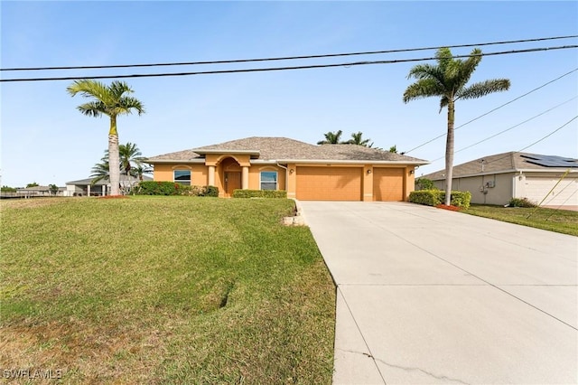 view of front facade with a garage and a front yard