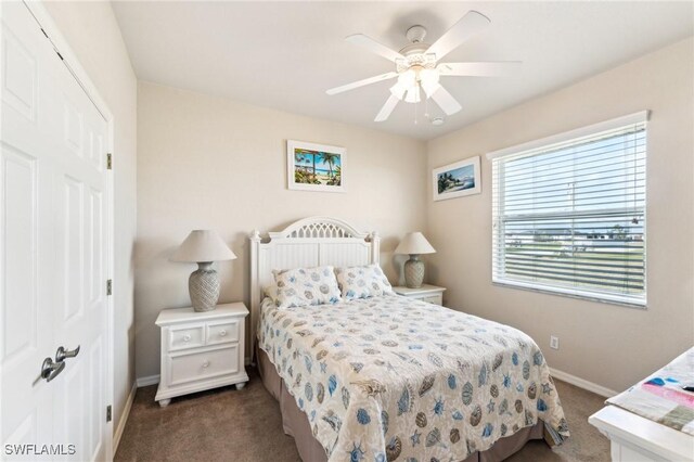 carpeted bedroom featuring ceiling fan