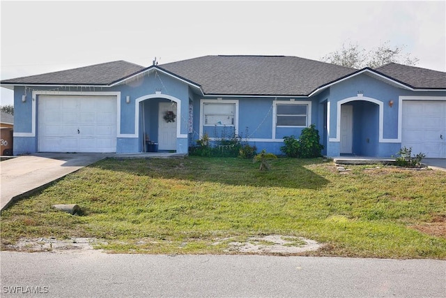 ranch-style house with a front lawn and a garage