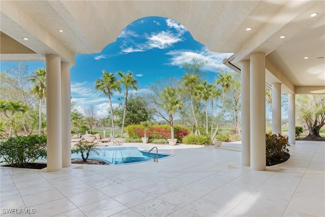 view of pool with a patio