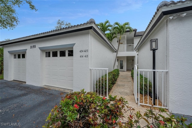 exterior space with a garage