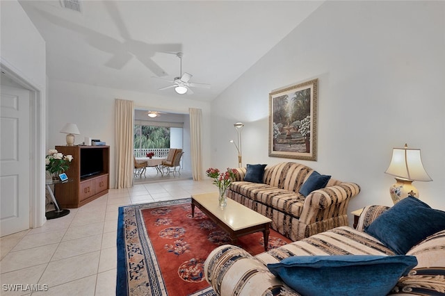 tiled living room featuring vaulted ceiling and ceiling fan