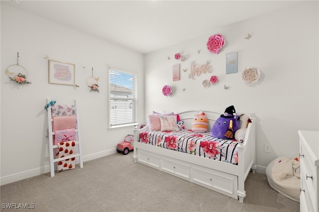 bedroom featuring light colored carpet