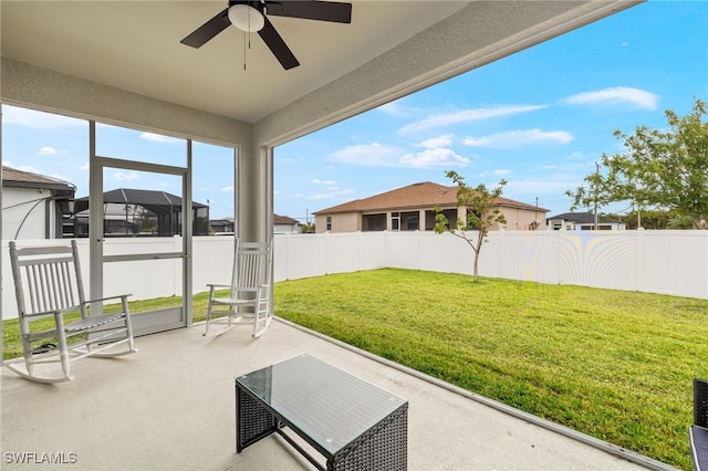 view of patio / terrace featuring ceiling fan