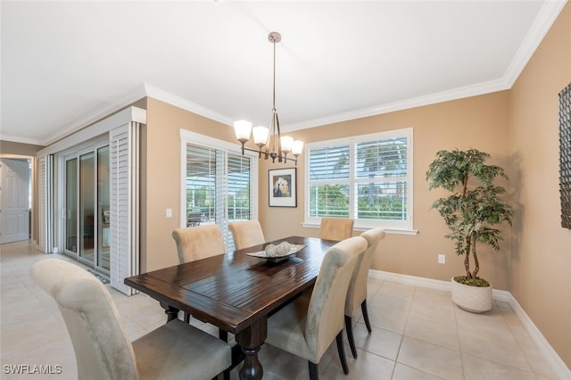 dining space with a chandelier, ornamental molding, and light tile patterned floors