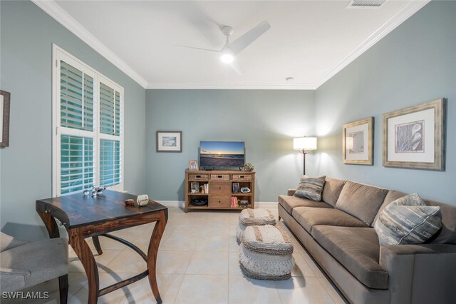 tiled living room featuring ceiling fan and ornamental molding