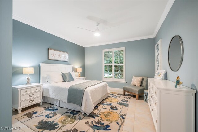 bedroom featuring a ceiling fan, crown molding, and light tile patterned flooring