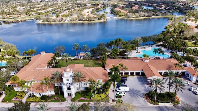 aerial view with a water view and a residential view