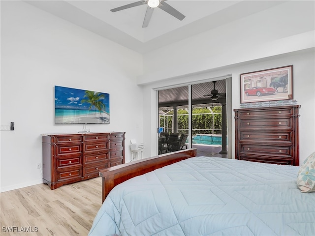 bedroom with ceiling fan, access to exterior, and light hardwood / wood-style floors