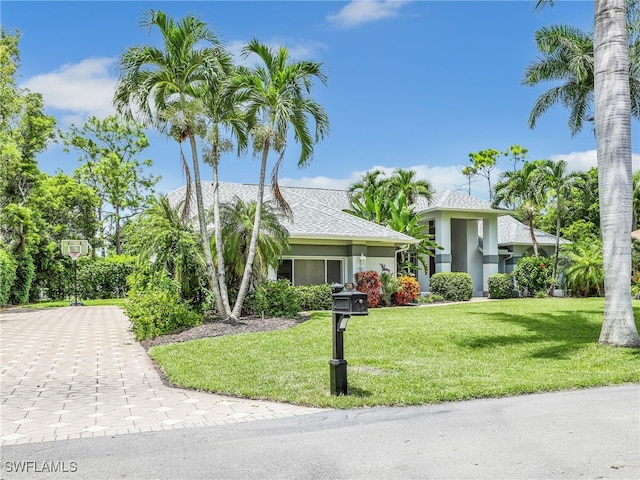 view of front of home with a front lawn