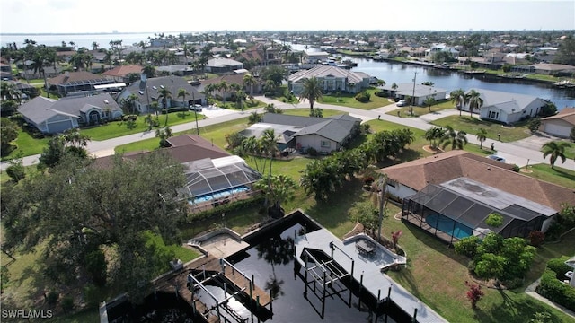 drone / aerial view with a water view