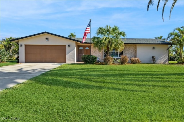 ranch-style house featuring a garage and a front lawn