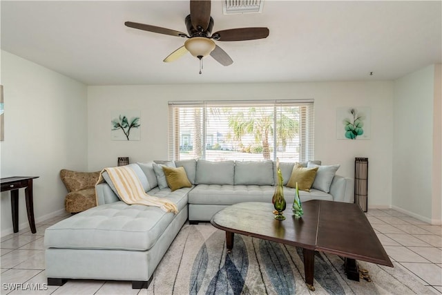 living room with light tile patterned floors and ceiling fan