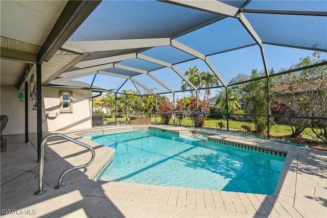 view of swimming pool featuring a patio, a jacuzzi, and glass enclosure