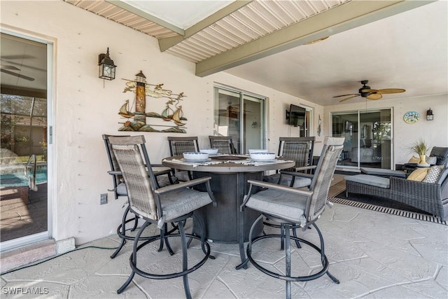 view of patio / terrace with ceiling fan