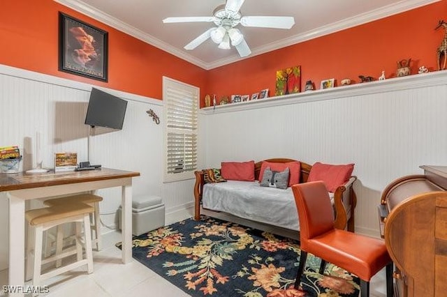 bedroom featuring ceiling fan, light tile patterned floors, and ornamental molding