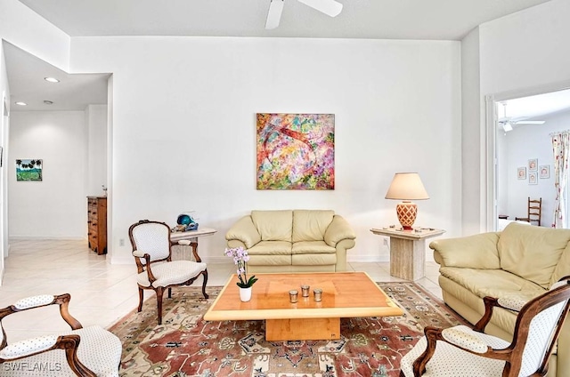 tiled living room with ceiling fan