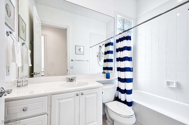 full bathroom with toilet, vanity, and shower / bathtub combination with curtain