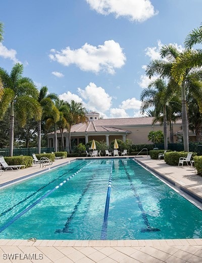 view of swimming pool featuring a patio