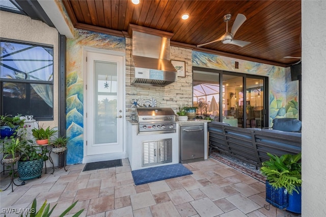 view of patio / terrace with ceiling fan, an outdoor kitchen, and area for grilling