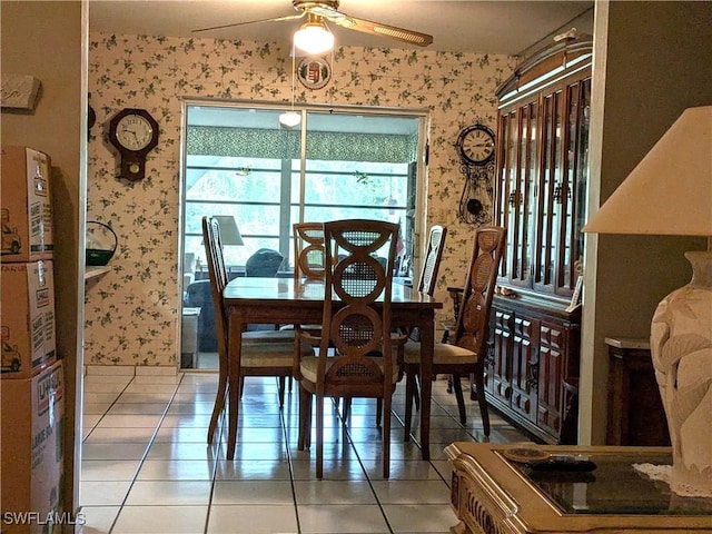 dining space featuring tile patterned floors and ceiling fan