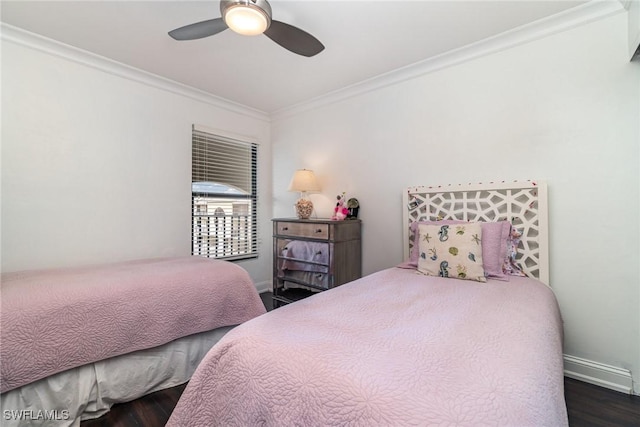 bedroom with ceiling fan, dark hardwood / wood-style flooring, and crown molding