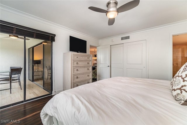 bedroom with ceiling fan, a closet, access to outside, and ornamental molding