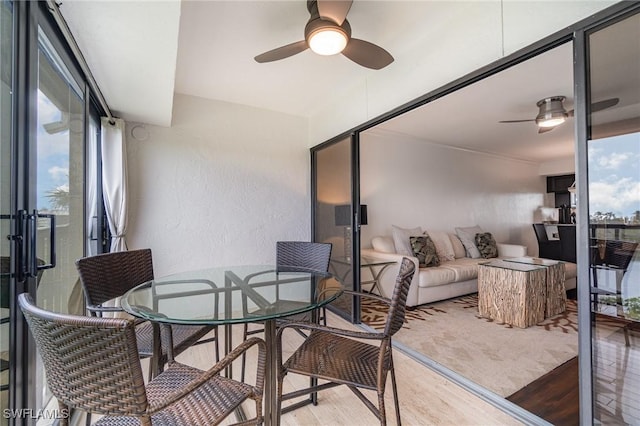 interior space featuring ceiling fan