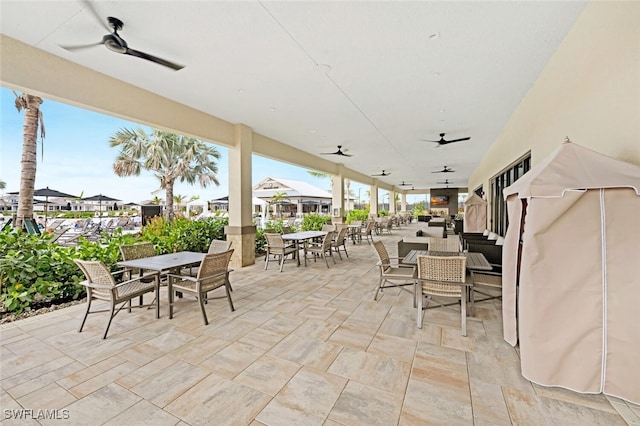 view of patio featuring ceiling fan