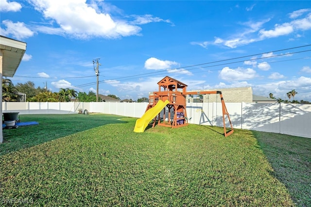 view of play area with a yard