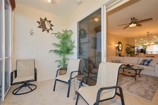 view of patio / terrace featuring ceiling fan and an outdoor hangout area