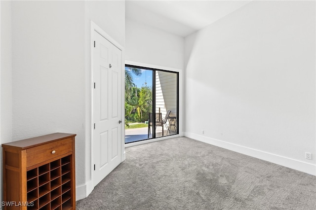 unfurnished room featuring carpet floors