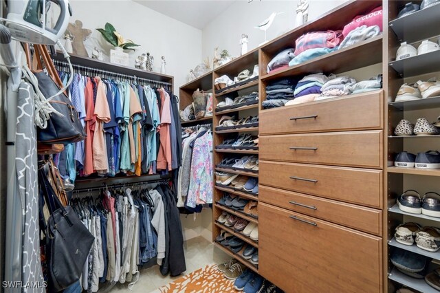 walk in closet featuring tile patterned floors