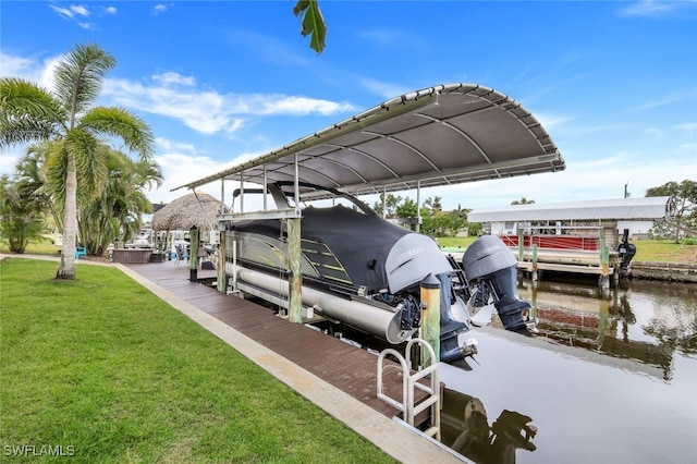 dock area featuring a yard and a water view