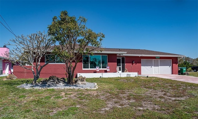 ranch-style house with a front lawn and a garage