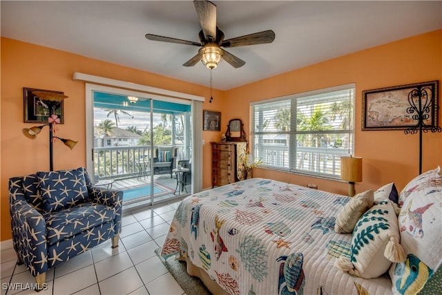 tiled bedroom featuring ceiling fan and access to outside