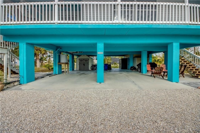 view of vehicle parking with a carport