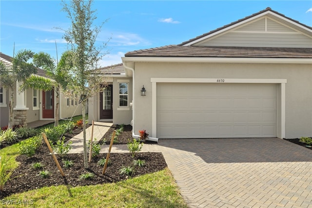 view of front of home featuring a garage