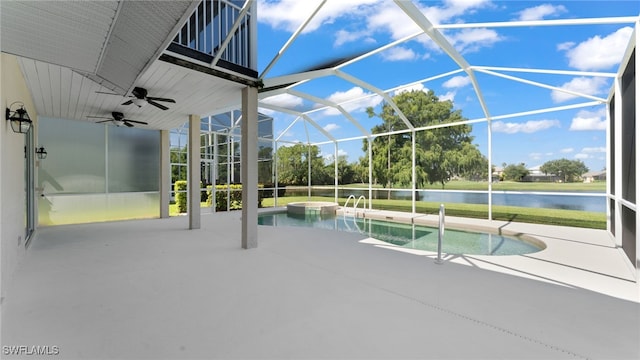 view of pool featuring ceiling fan, a jacuzzi, a patio area, a water view, and a lanai