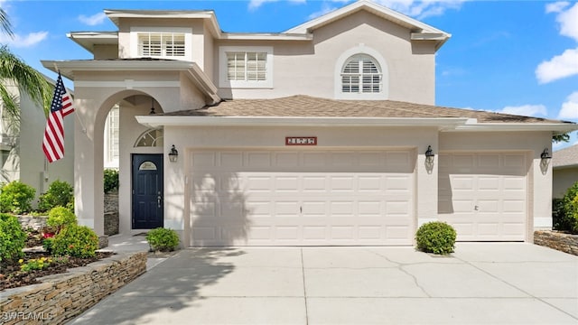 view of front of home with a garage