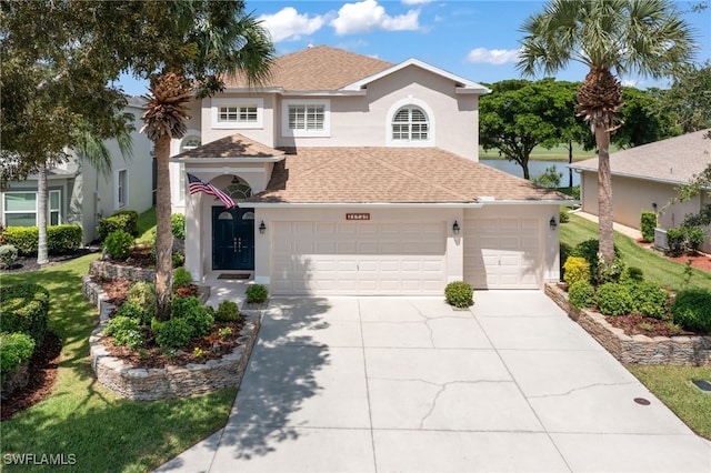 view of front of house with a garage