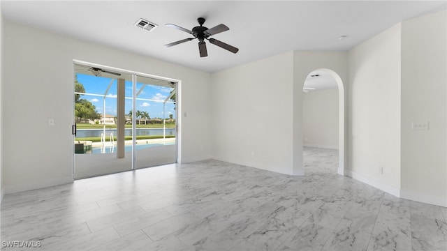 spare room featuring ceiling fan