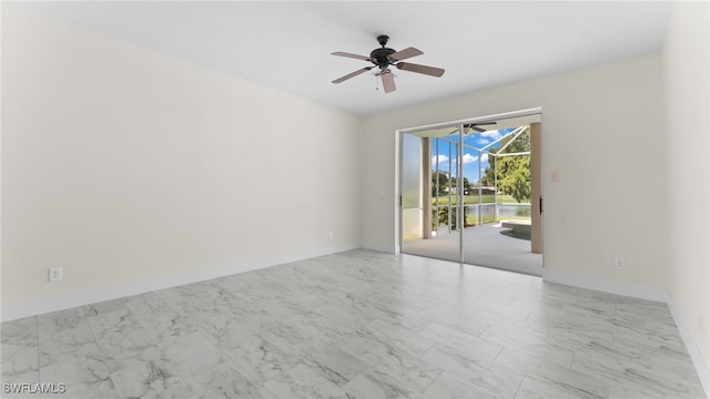 unfurnished room with ceiling fan