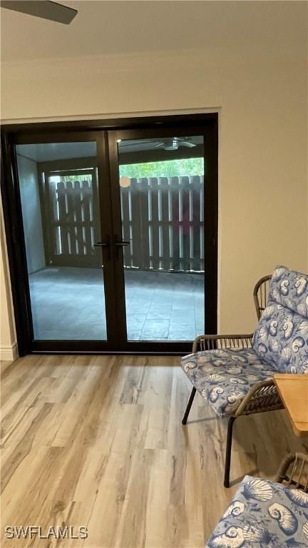 doorway to outside with hardwood / wood-style floors and french doors