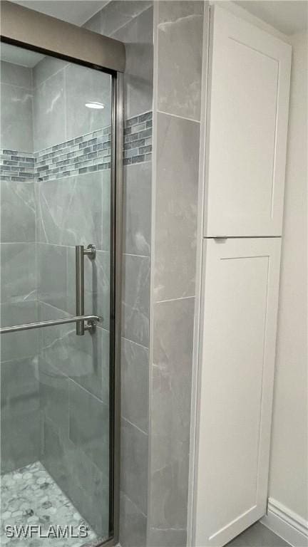 bathroom featuring walk in shower