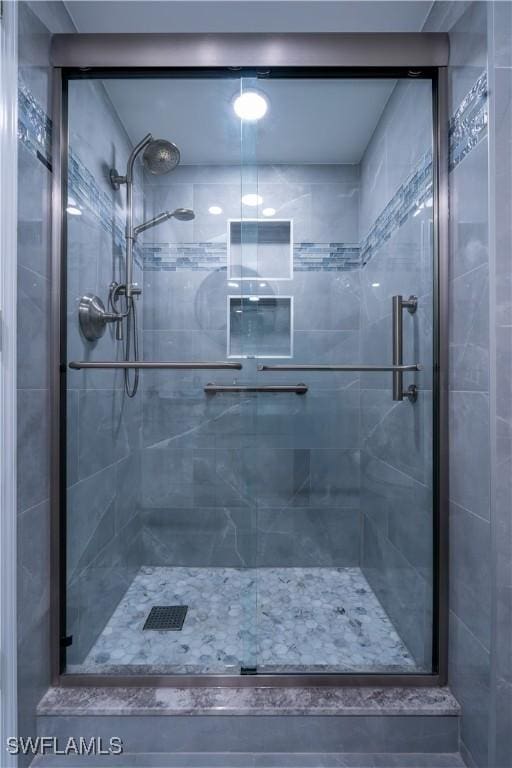 bathroom with an enclosed shower