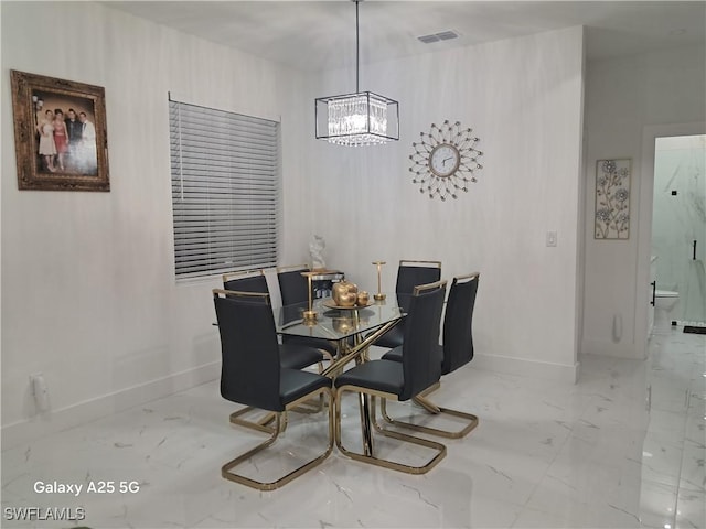 dining room with an inviting chandelier